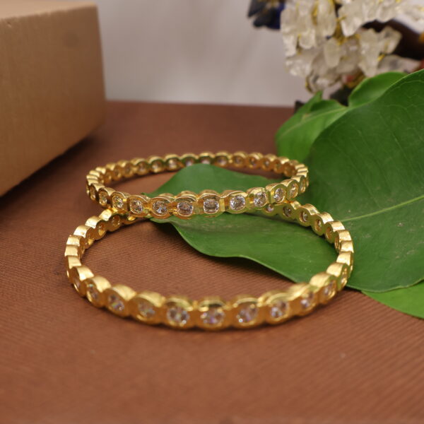 Elegant Stone-Studded Gold Bangles